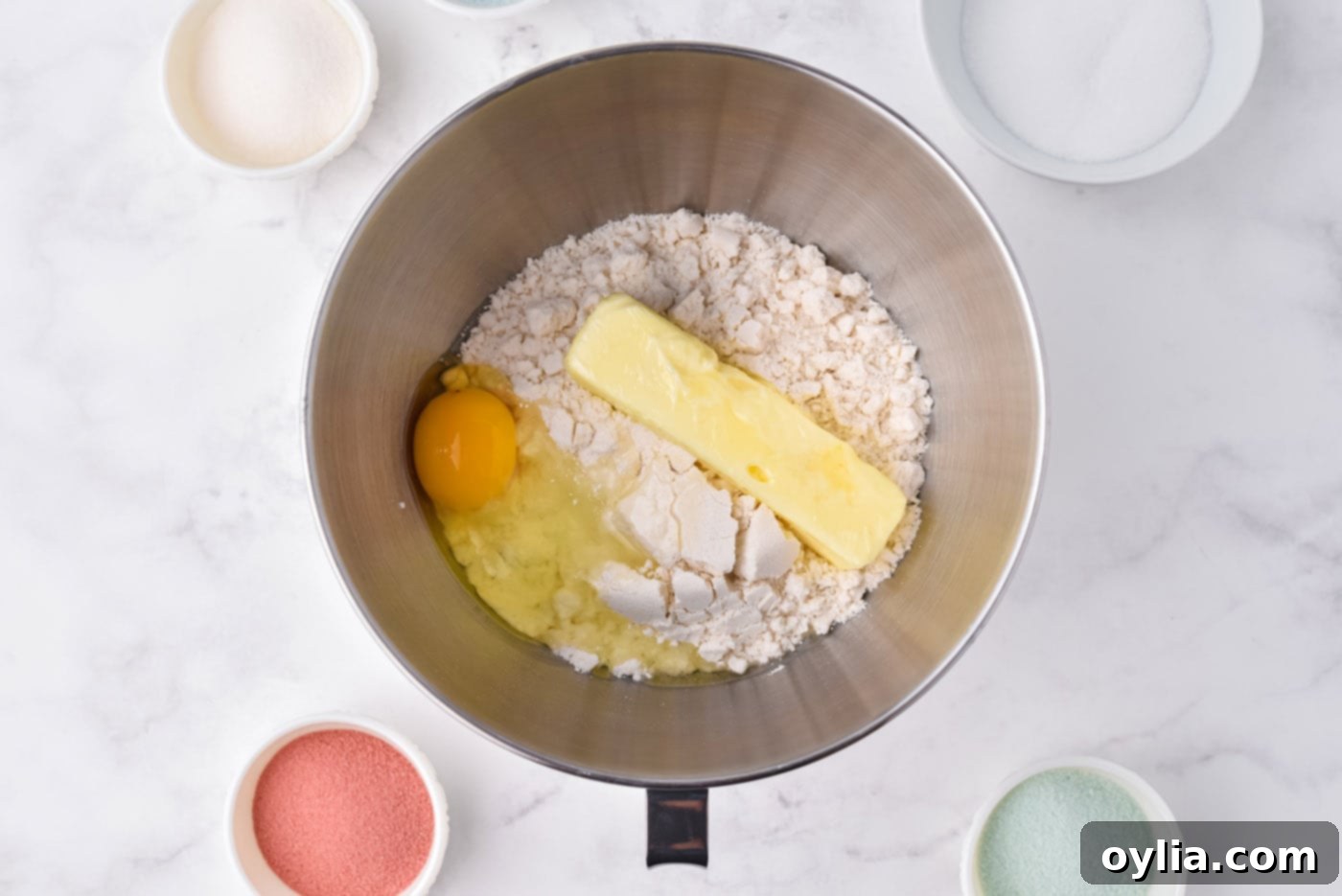 sugar cookie ingredients in a mixing bowl