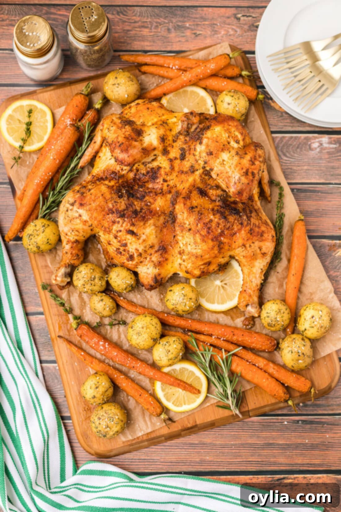 Spatchcock Chicken with roast vegetables on board