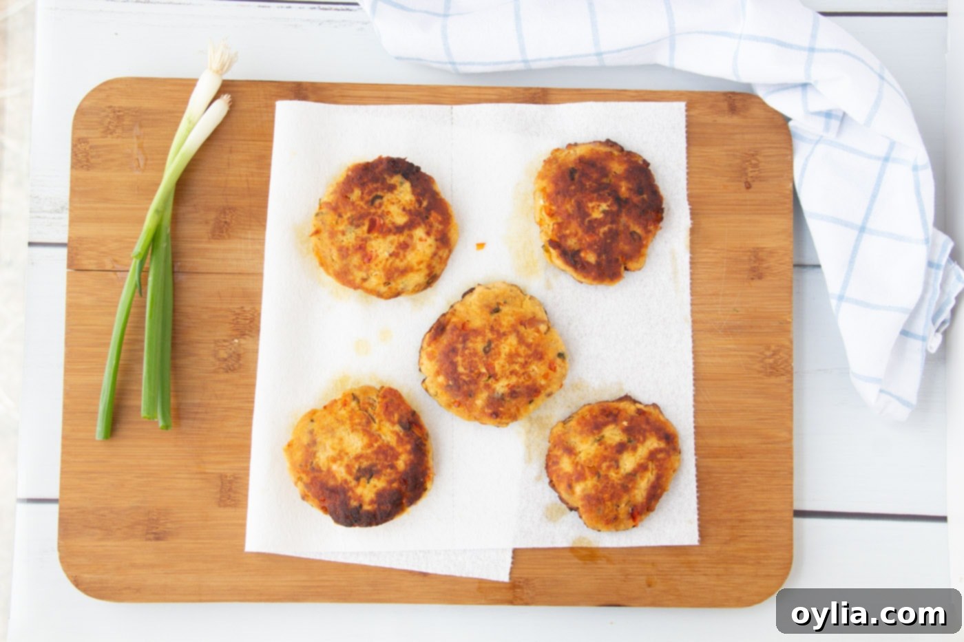 cooked fish cakes on a paper towel