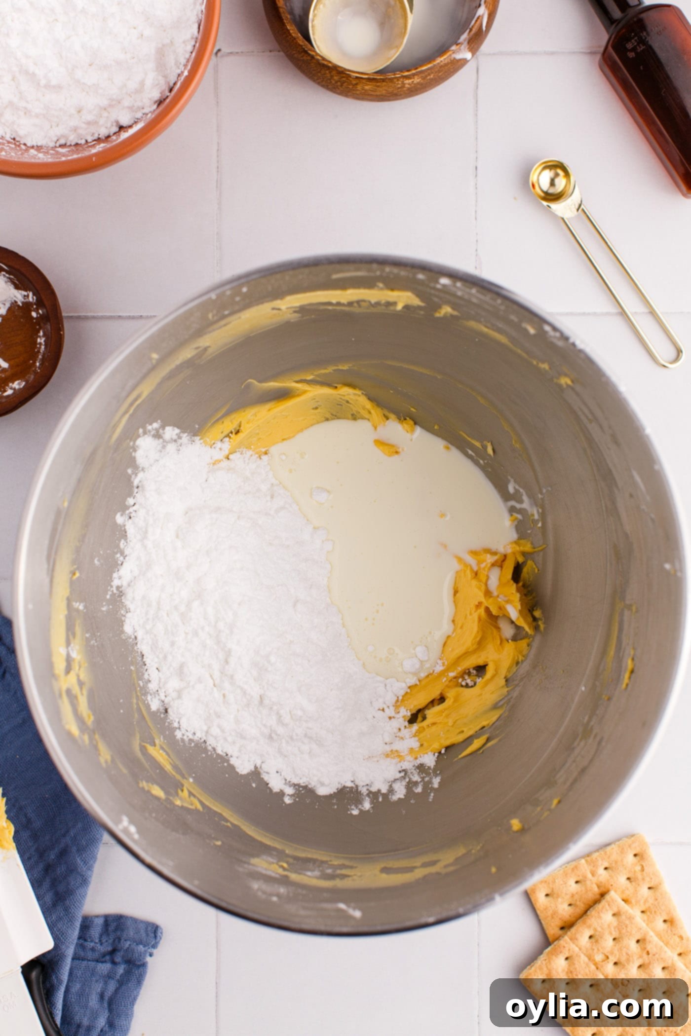 powdered sugar and custard powder in a mixing bowl