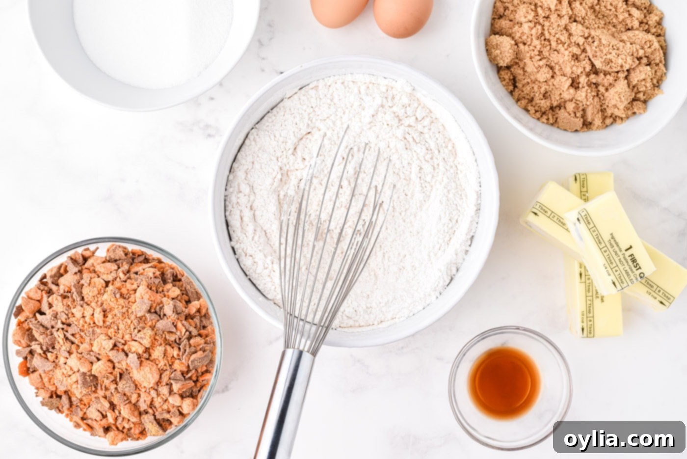 whisking flour, baking soda and baking powder in a bowl