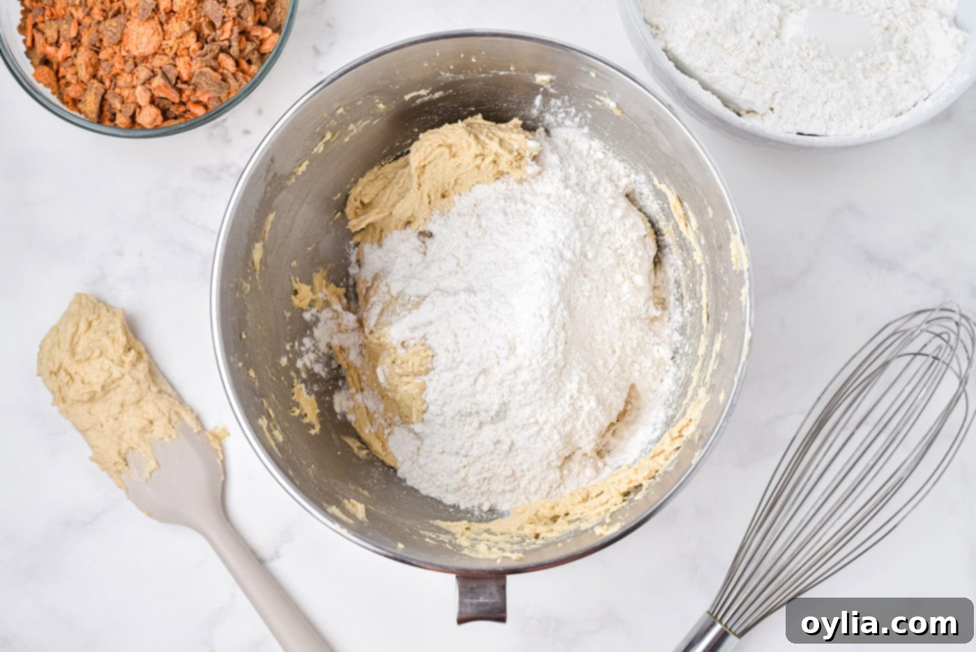 mixing flour into cookie dough