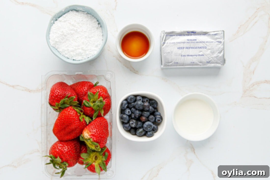Ingredients laid out for making Cheesecake Stuffed Strawberries.