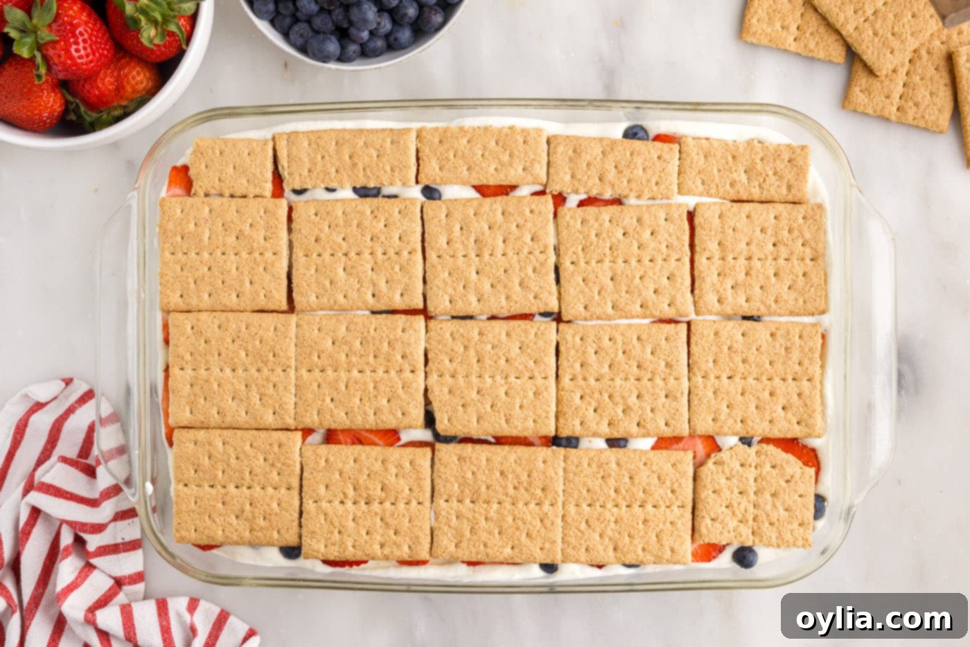 layer of graham crackers over fresh berries