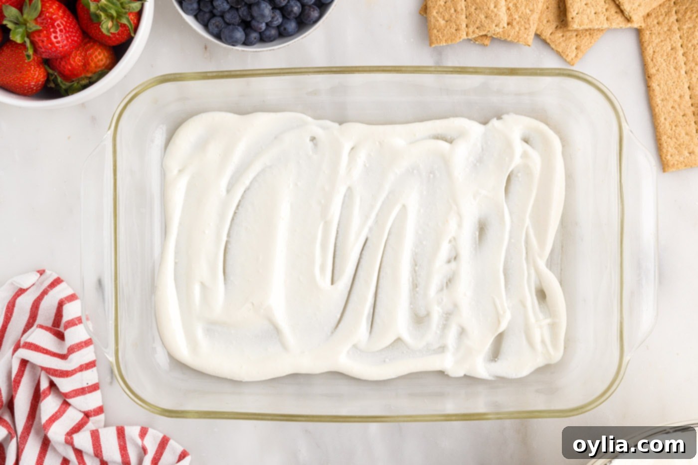 cool whip pudding mixture on bottom of 13x9 dish