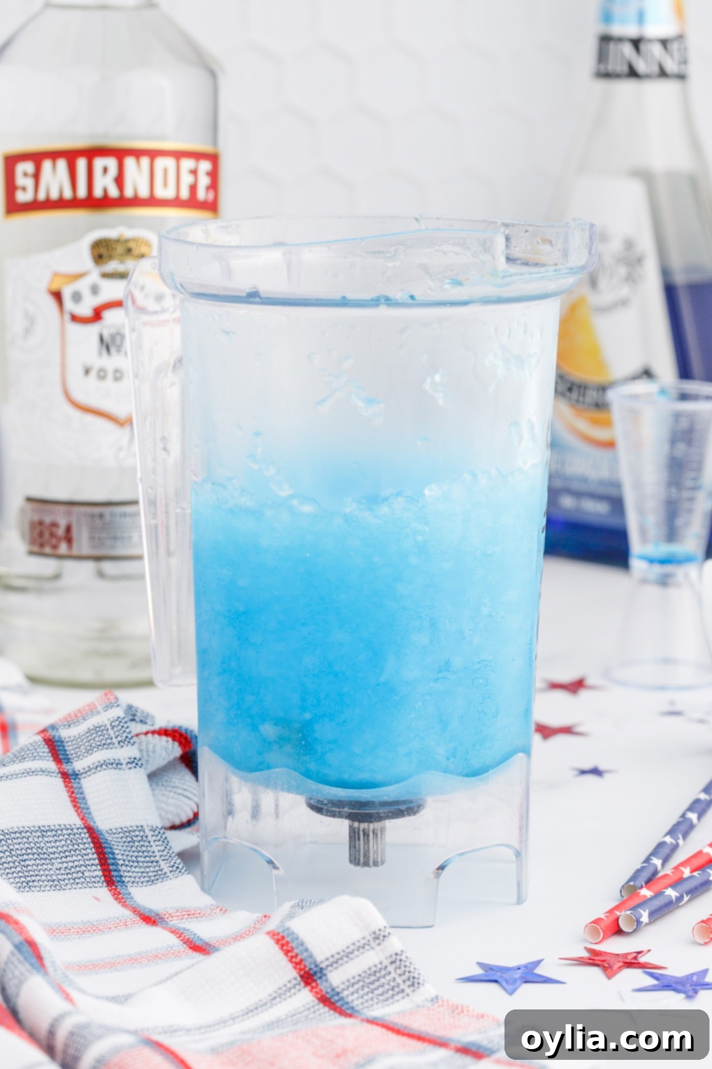 Blue curacao lemonade slush blending for the final blue layer