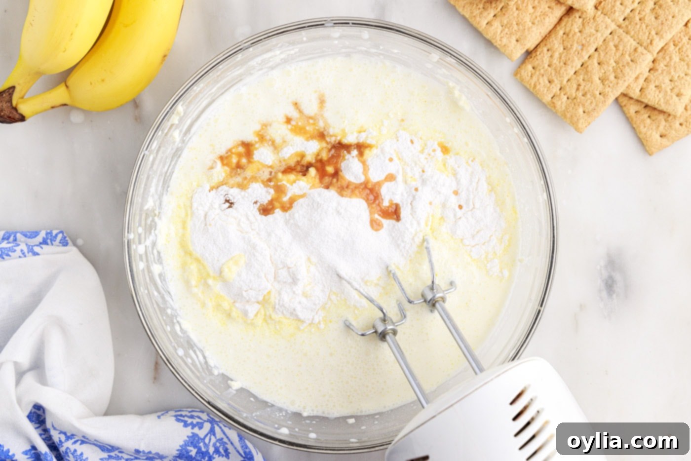 mixing banana pudding mix and vanilla into cream cheese mixture