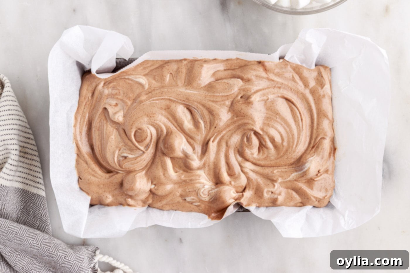 rocky road ice cream swirled in a pan