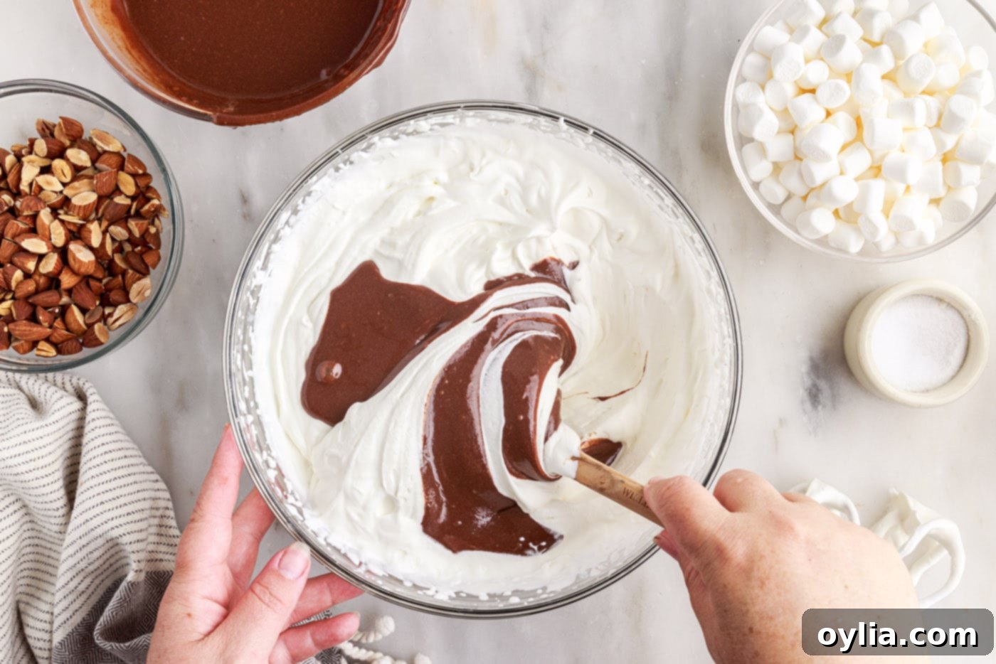 folding chocolate mixture into whipped cream