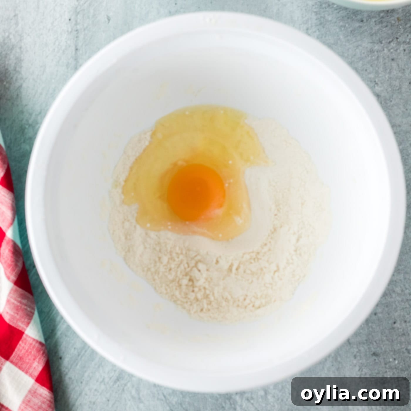 egg and milk mixed with flour and baking powder
