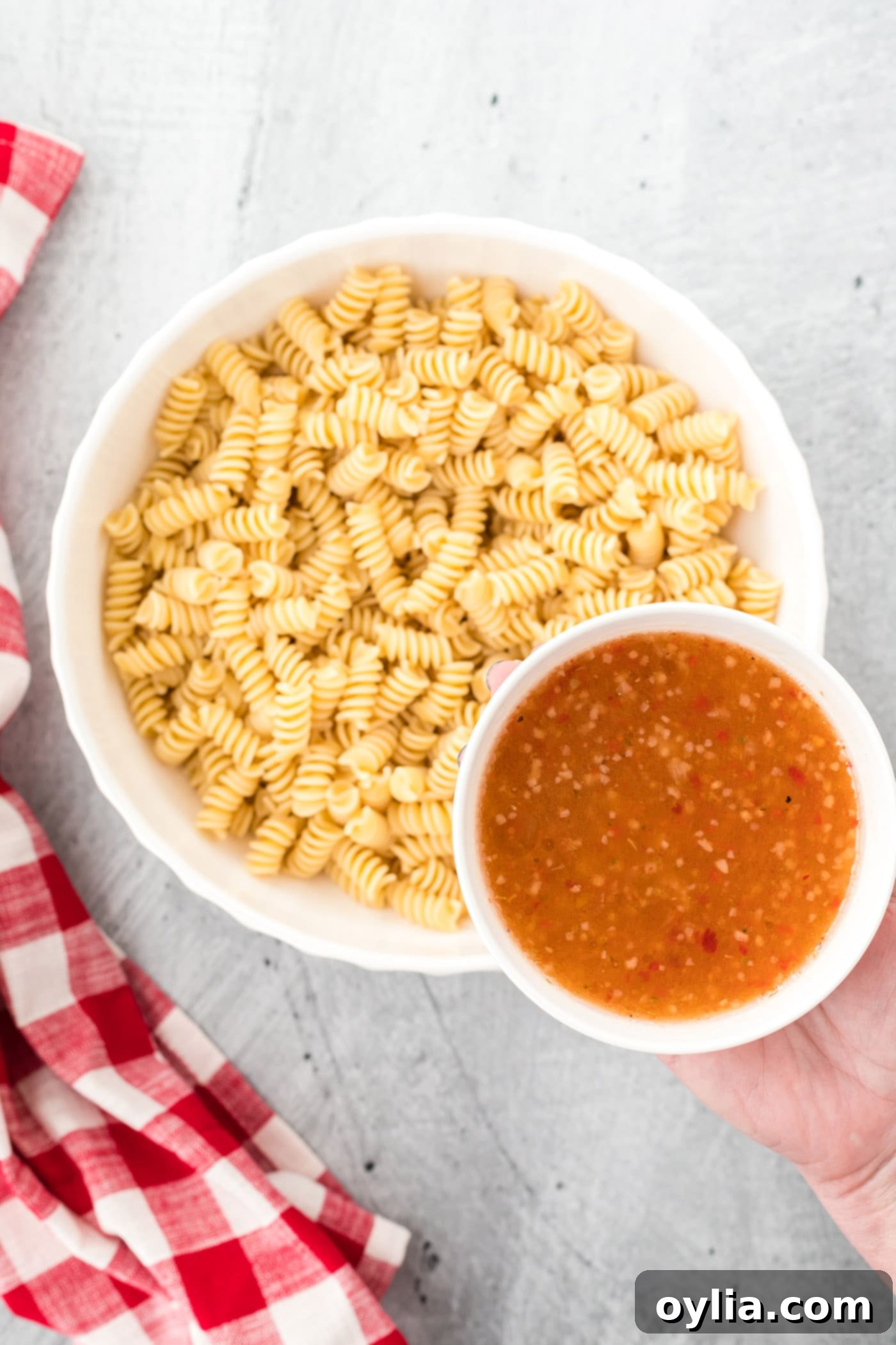 Italian dressing over pasta noodles