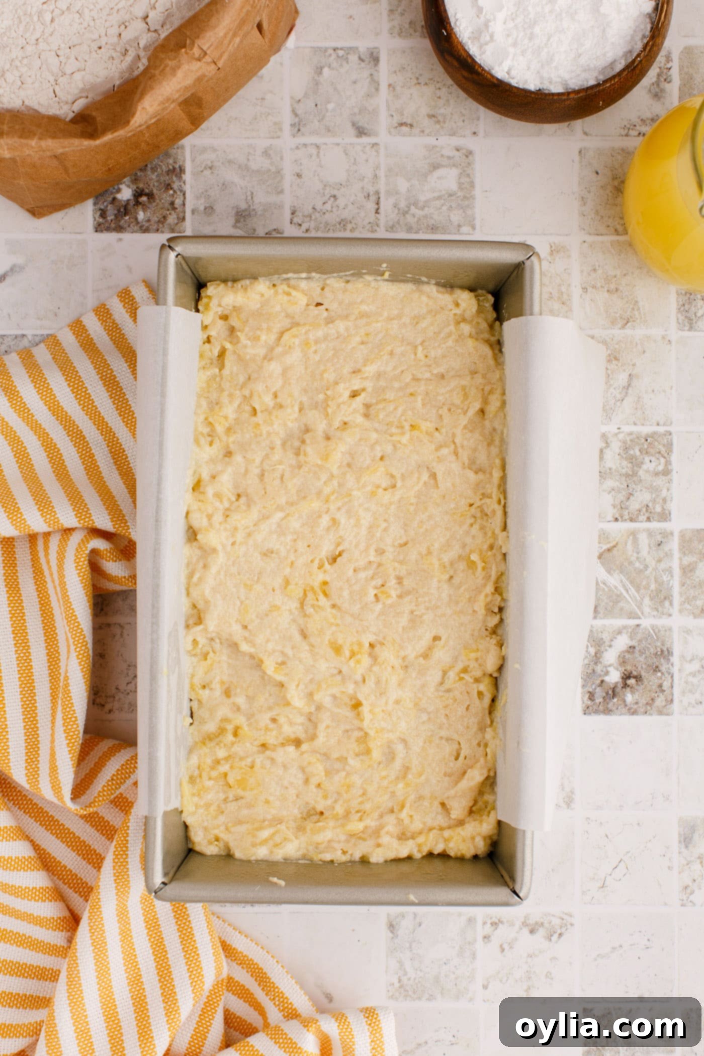 pineapple quick bread in a loaf pan