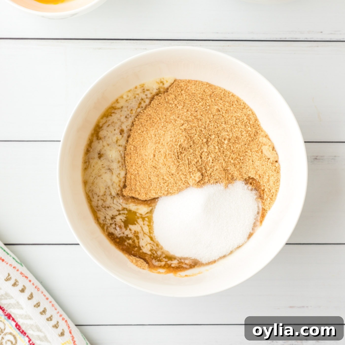 crust ingredients in a bowl for mini pies