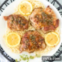 Veal Piccata dish with sauce, capers, and lemon