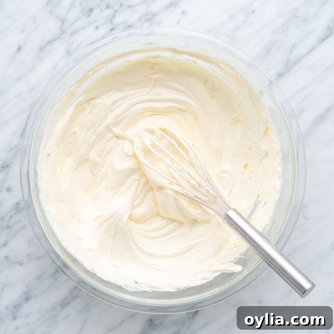 Creamy pineapple frosting after mixing, ready to be spread
