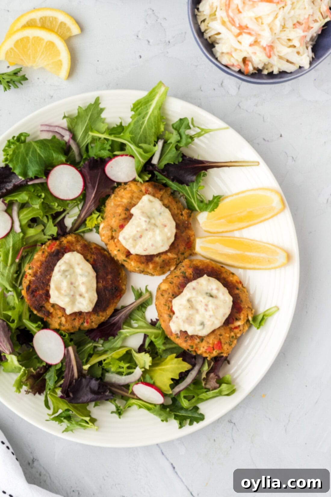Delicious Crispy Crab Cakes with fresh greens, ready to be served