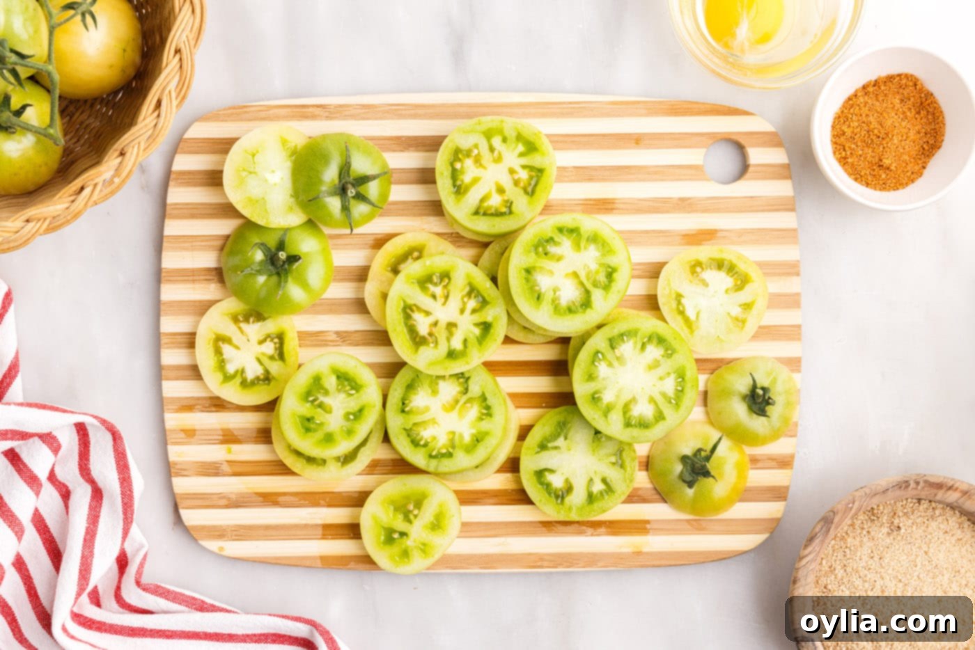 sliced green tomatoes on a cutting board