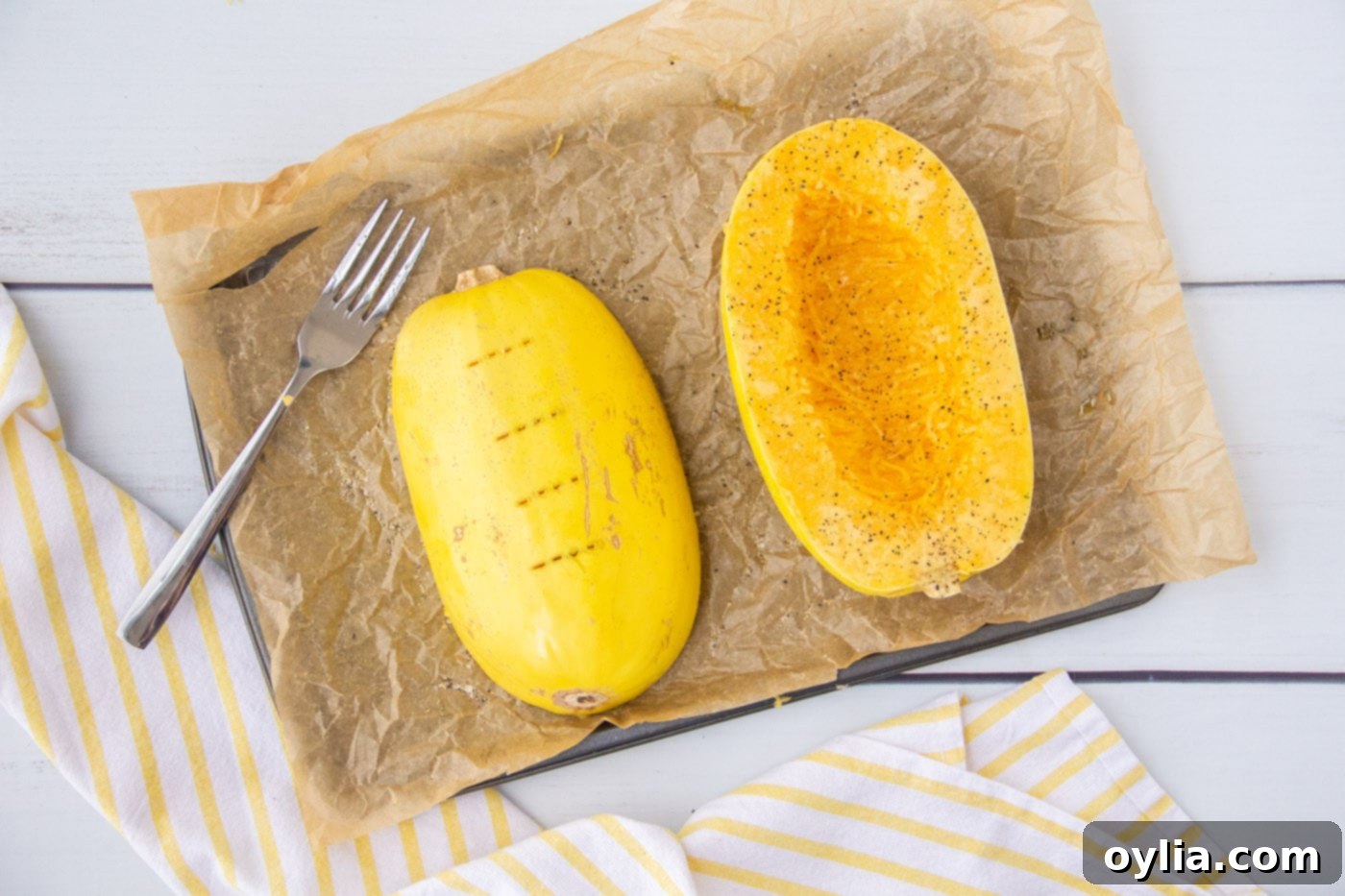 A close-up of spaghetti squash skin being pierced multiple times with a fork, preparing it for baking.