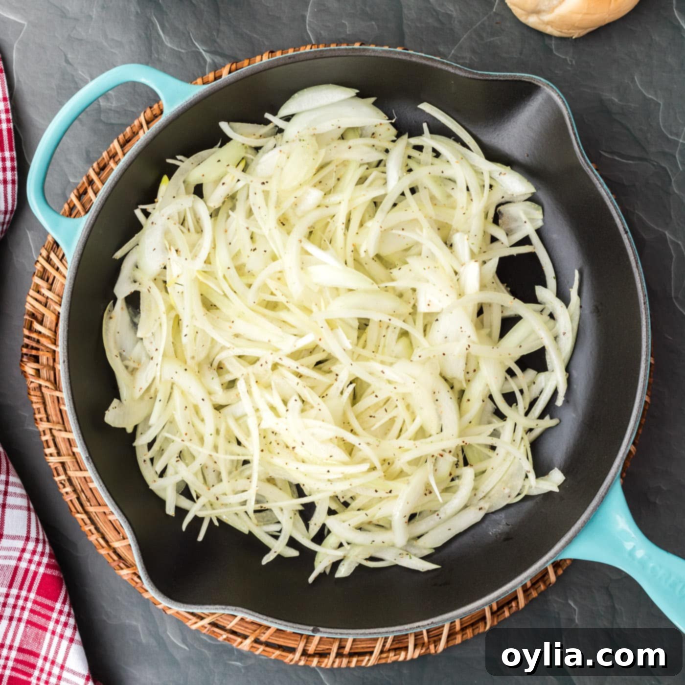 sliced onions in a skillet