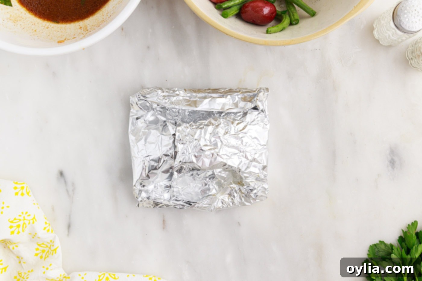 folded up chicken campfire foil packets