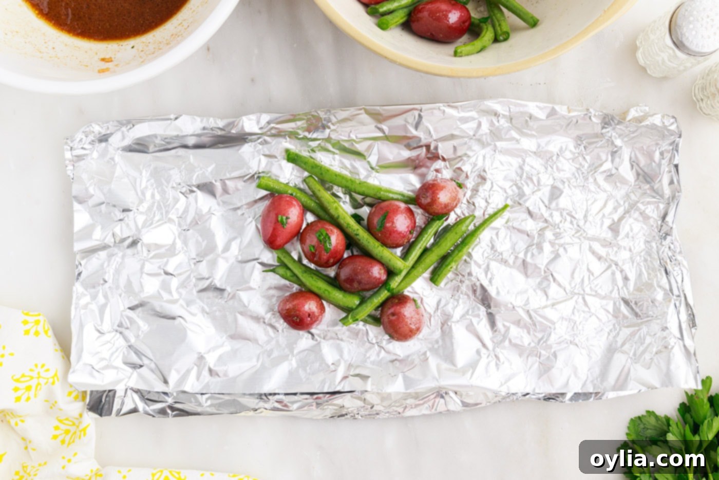 green beans and baby potatoes in foil
