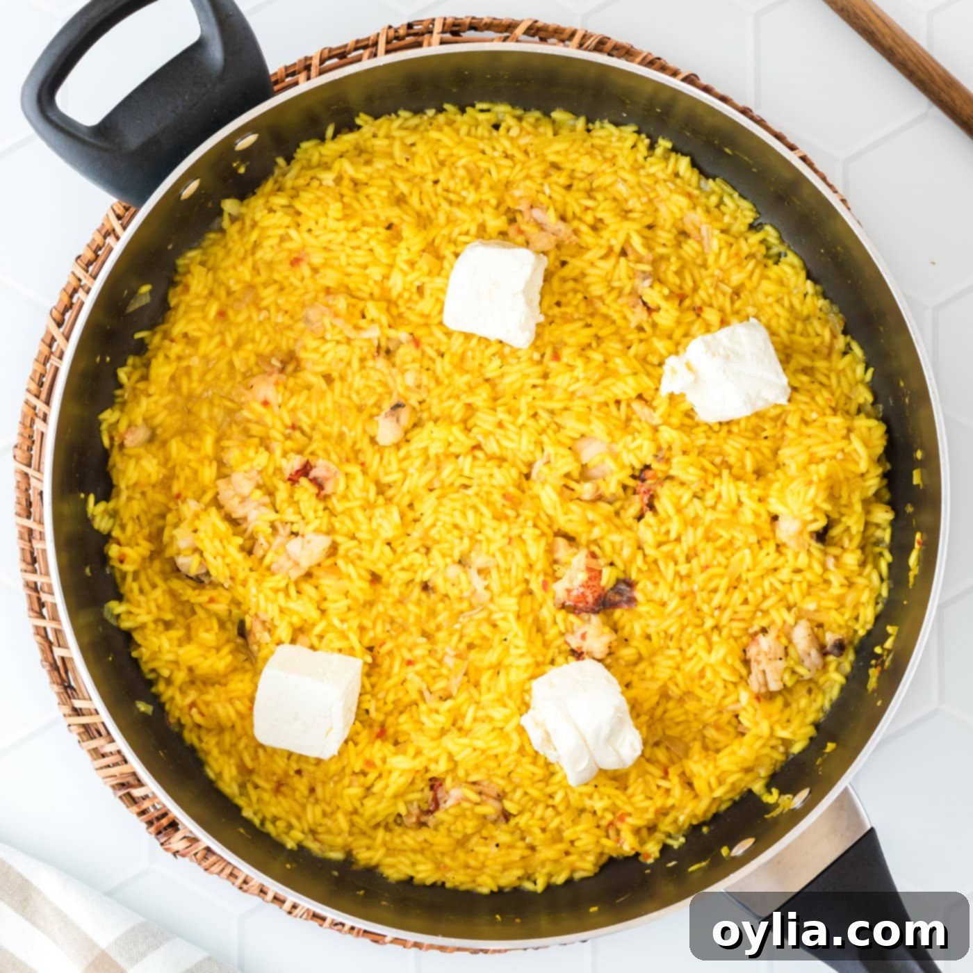 cream cheese on top of lobster risotto