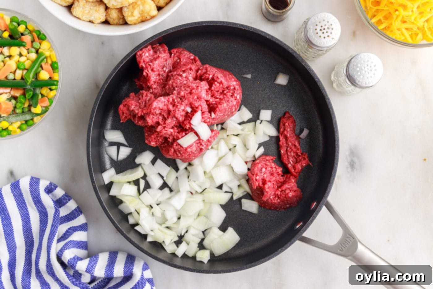 ground beef and onion in a skillet