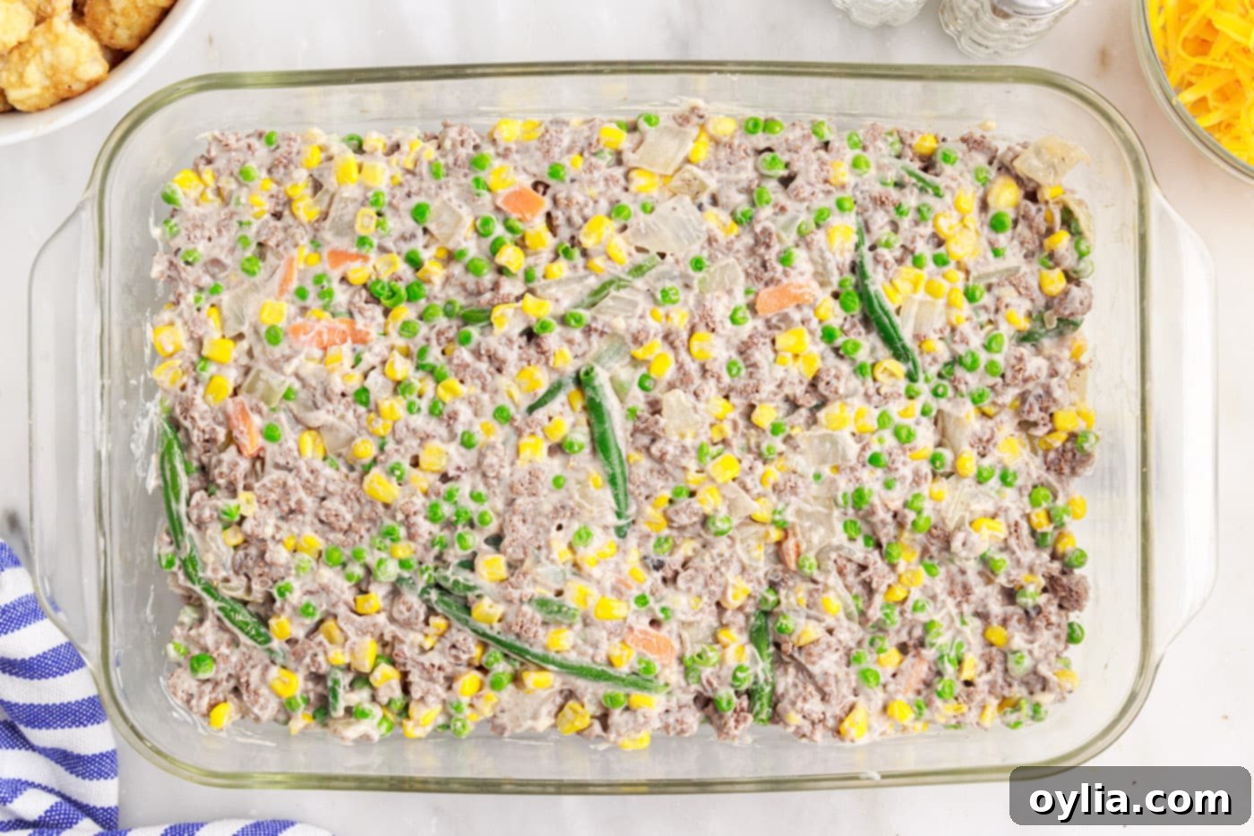 beef and veggie mixture in a casserole dish