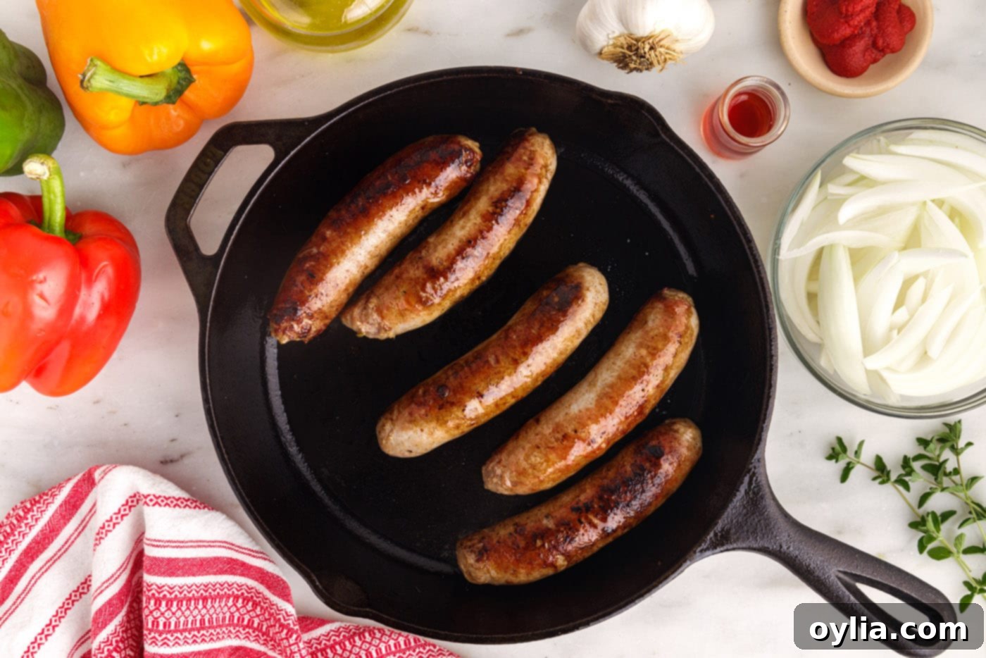Italian sausage seared in a skillet