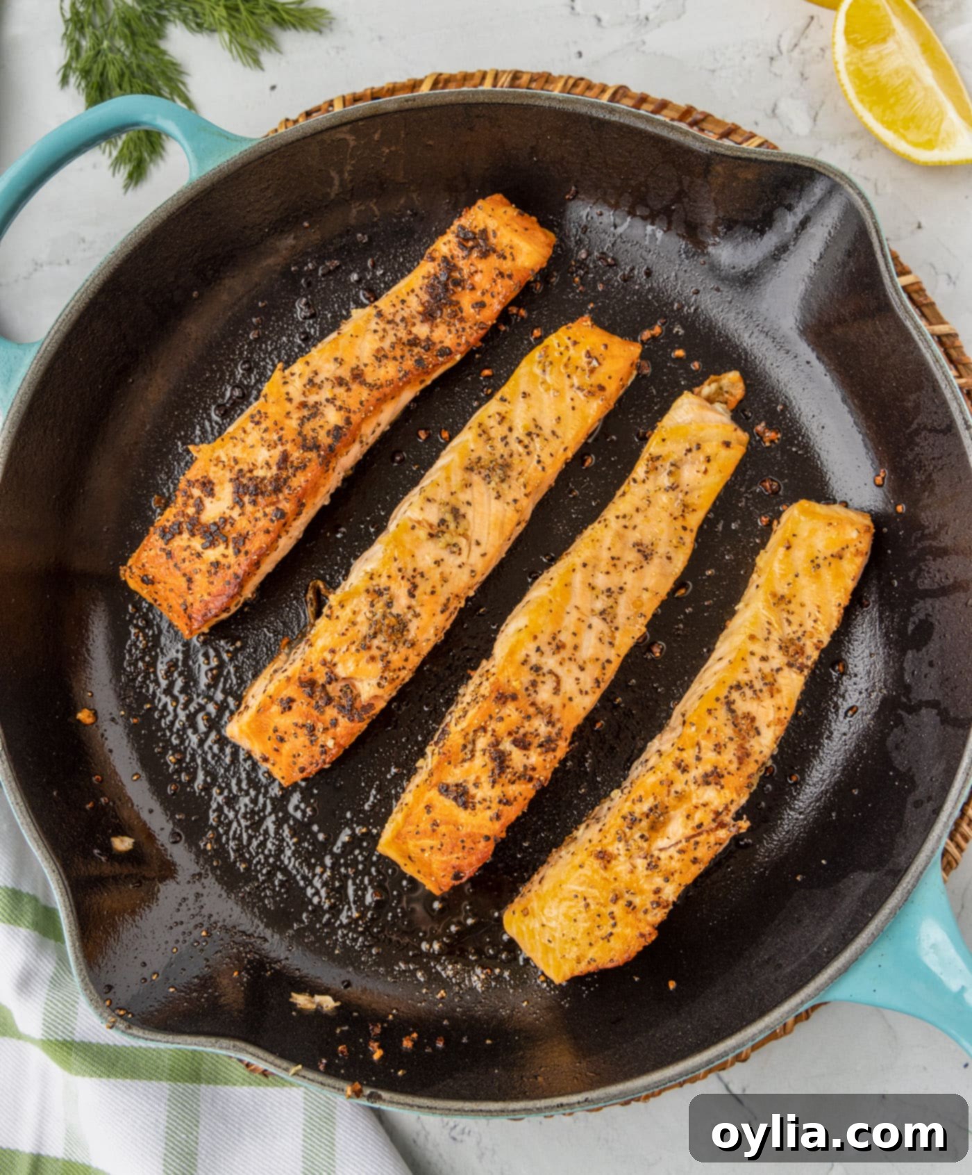 salmon pan fried in a skillet