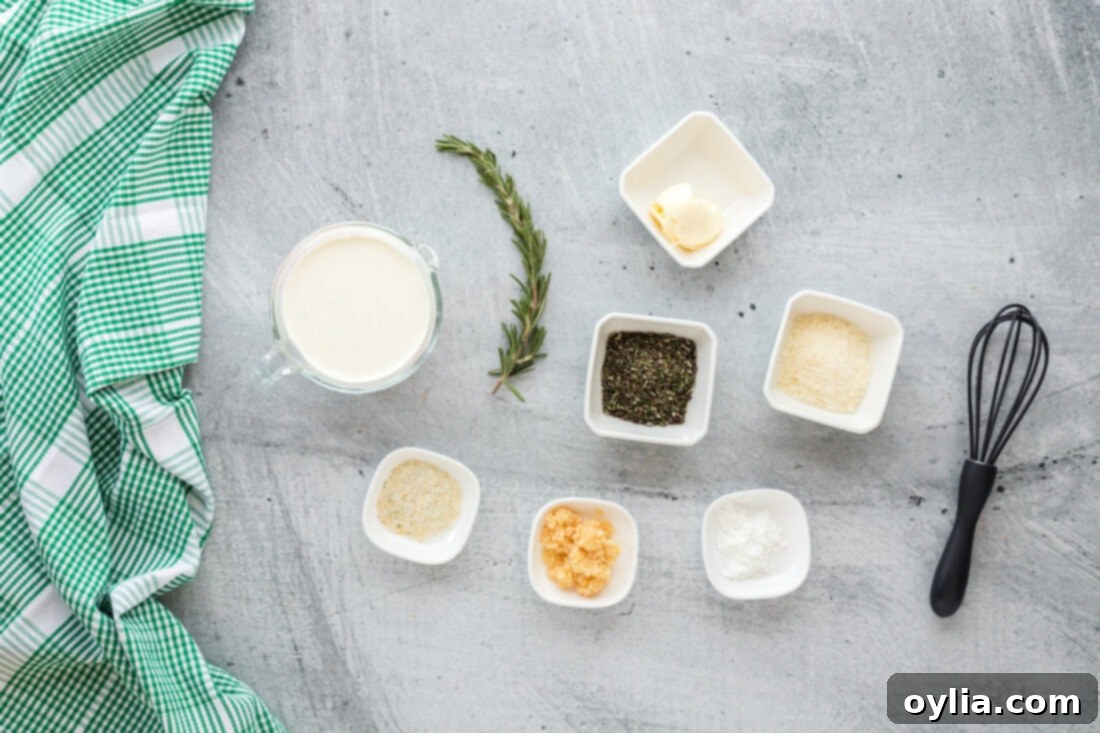 Creamy Rosemary Sauce 4 A collection of fresh ingredients laid out for making Rosemary Cream Sauce