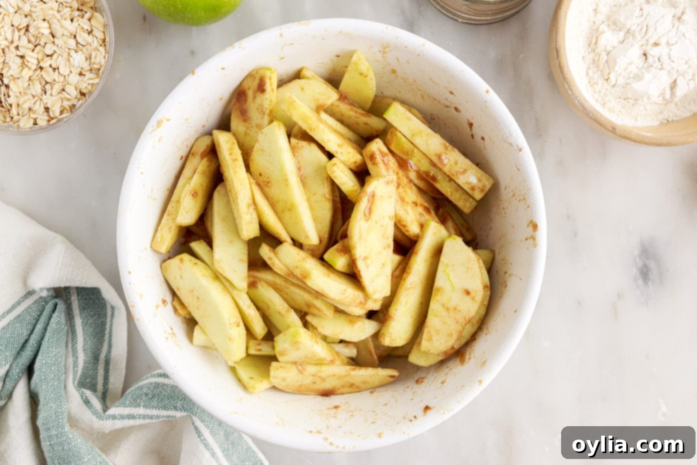 Apple crumble filling ready in a mixing bowl