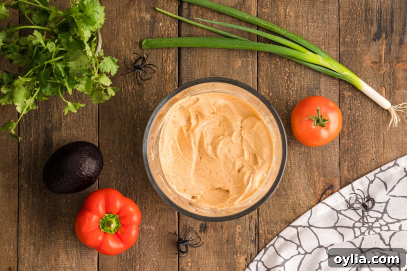 sour cream, cream cheese, and taco seasoning mixture blended to a smooth, creamy consistency in a bowl