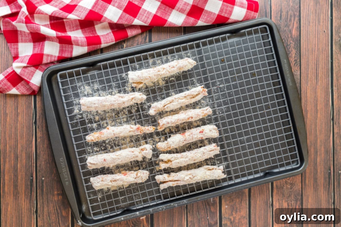 battered crab legs on a wire rack