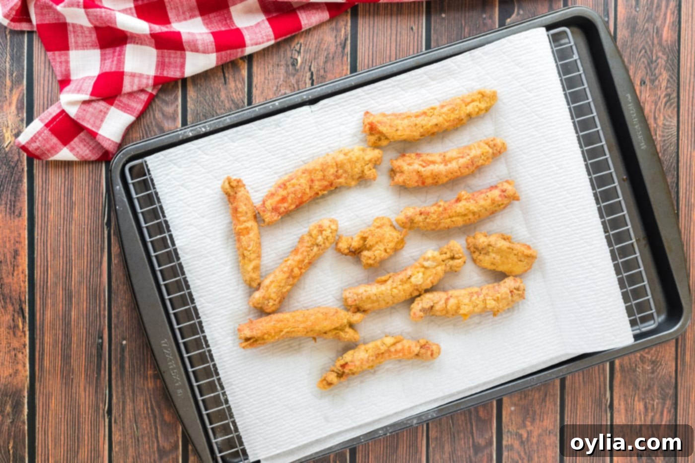 fried crab legs on a paper towel