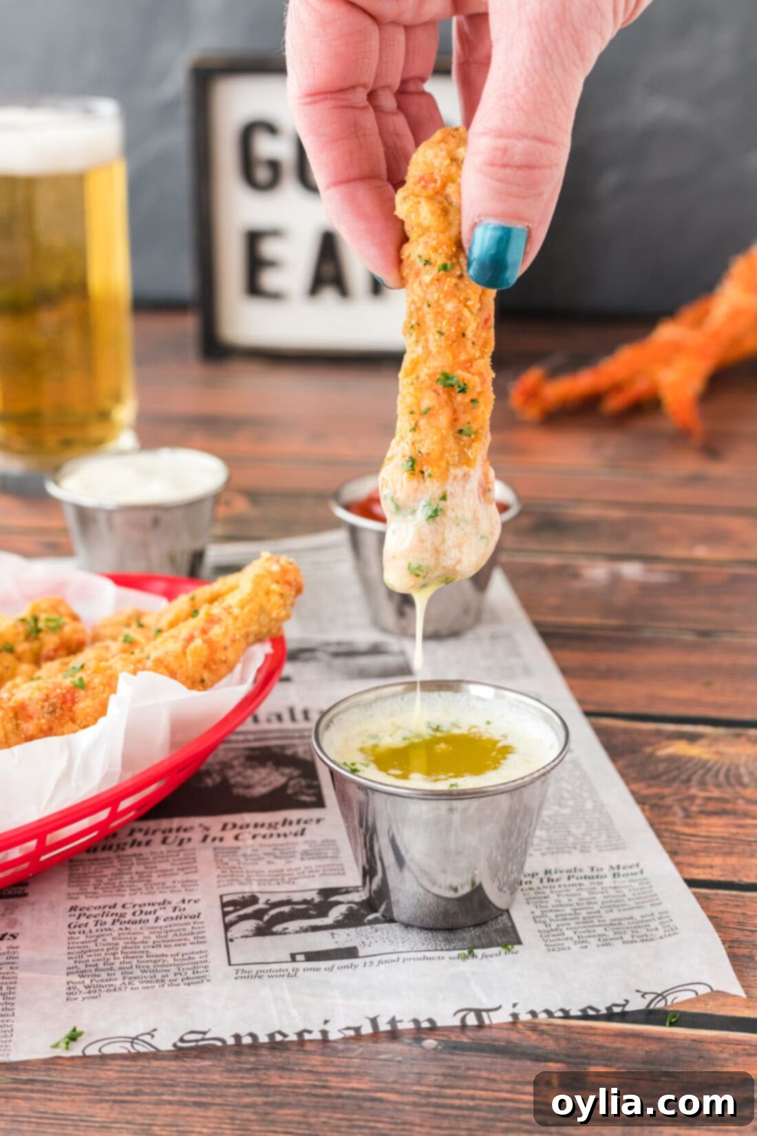 dipping Fried Crab Leg in butter