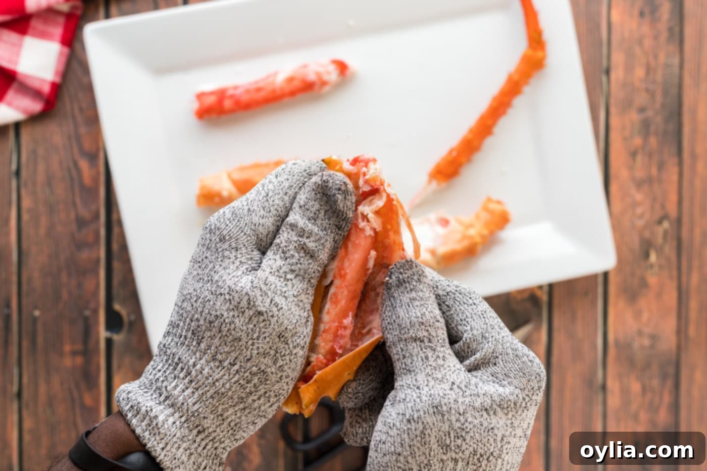 opening crab leg shell and removing meat