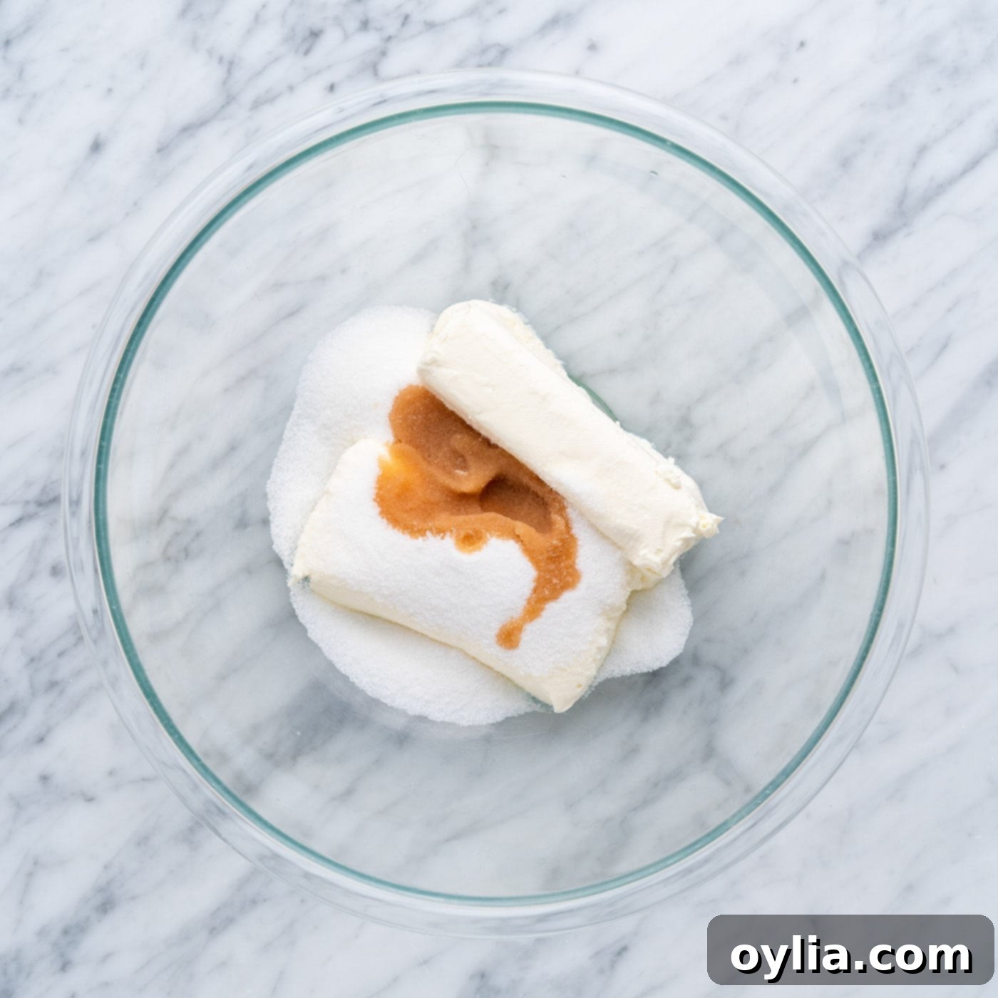 cream cheese, sugar and vanilla in a mixing bowl