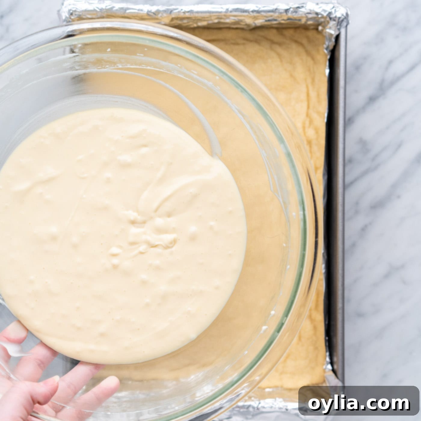 cheesecake mixture over shortbread crust