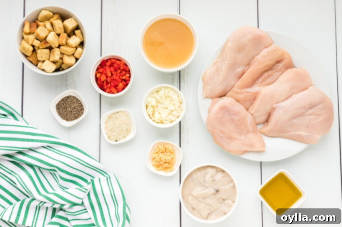 Assortment of fresh ingredients for Stuffed Chicken Breast, including bell peppers, onion, garlic, chicken broth, and cream of mushroom soup