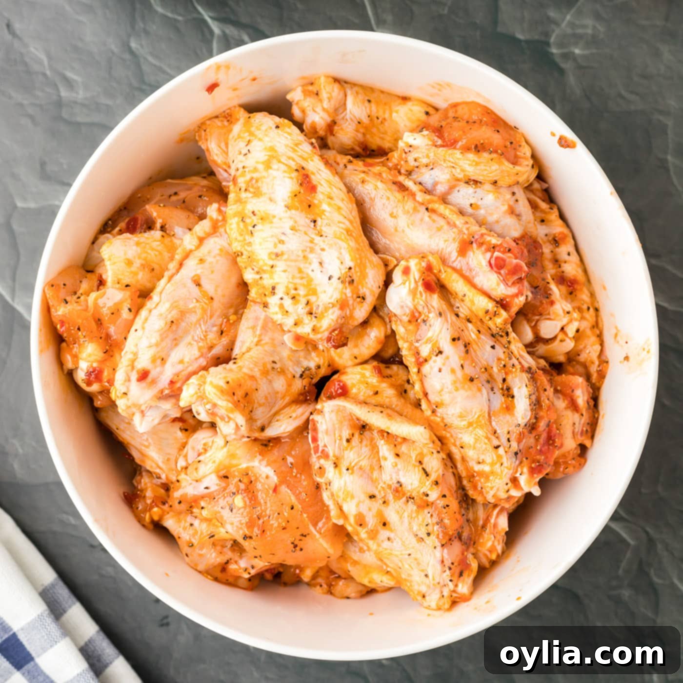 seasoned chicken wings in a bowl