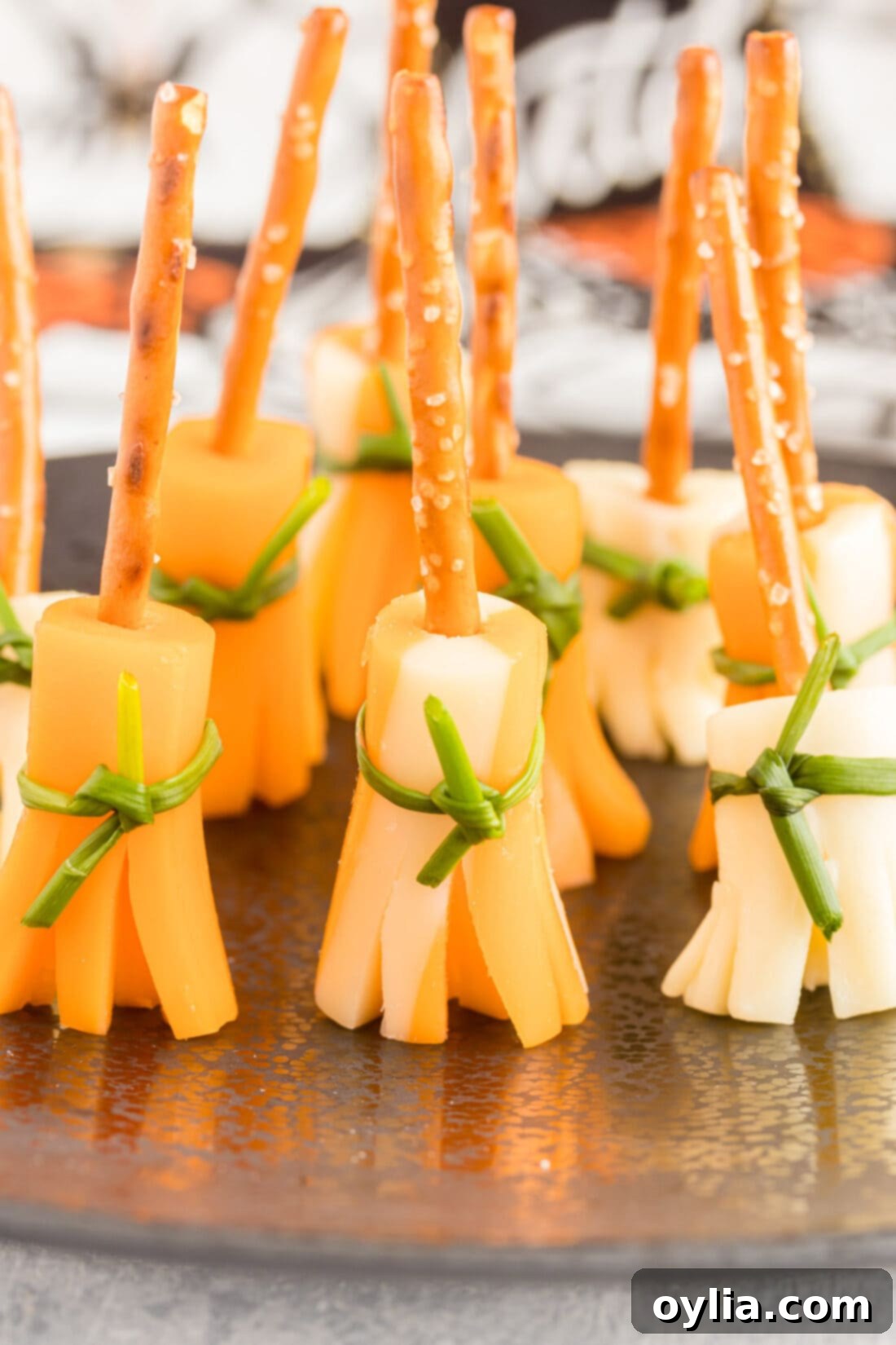 pretzel broomsticks on a tray