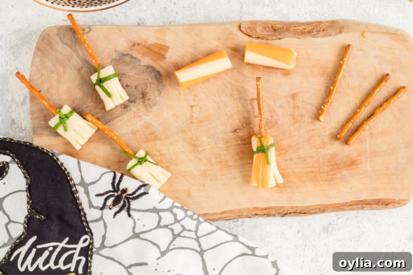 cheese and pretzel broomsticks for halloween