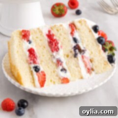 slice of Chantilly Cake on plate