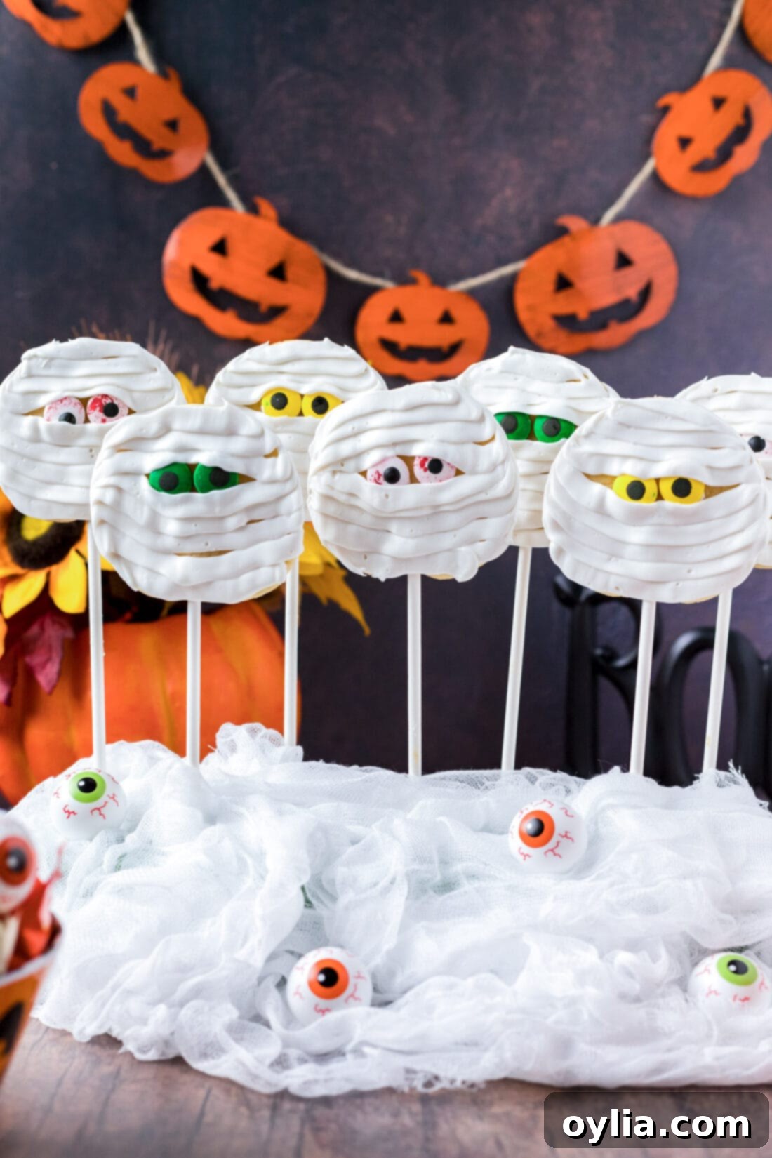 Spooky Bandage Bites 3 A bunch of Mummy Cookies on display for a Halloween party