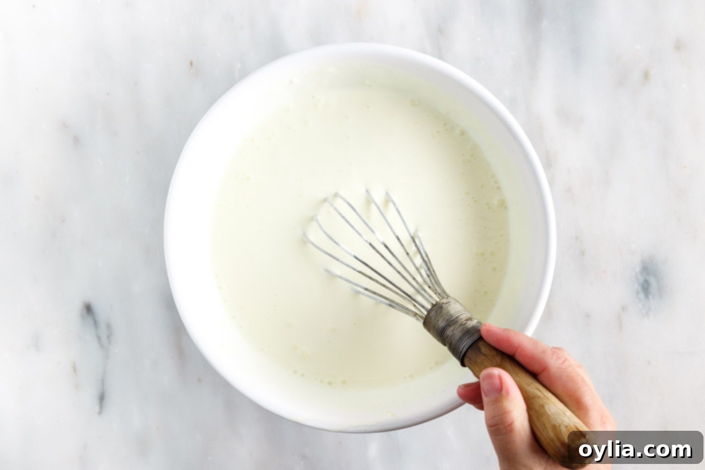 whisking lemon jello with cool whip