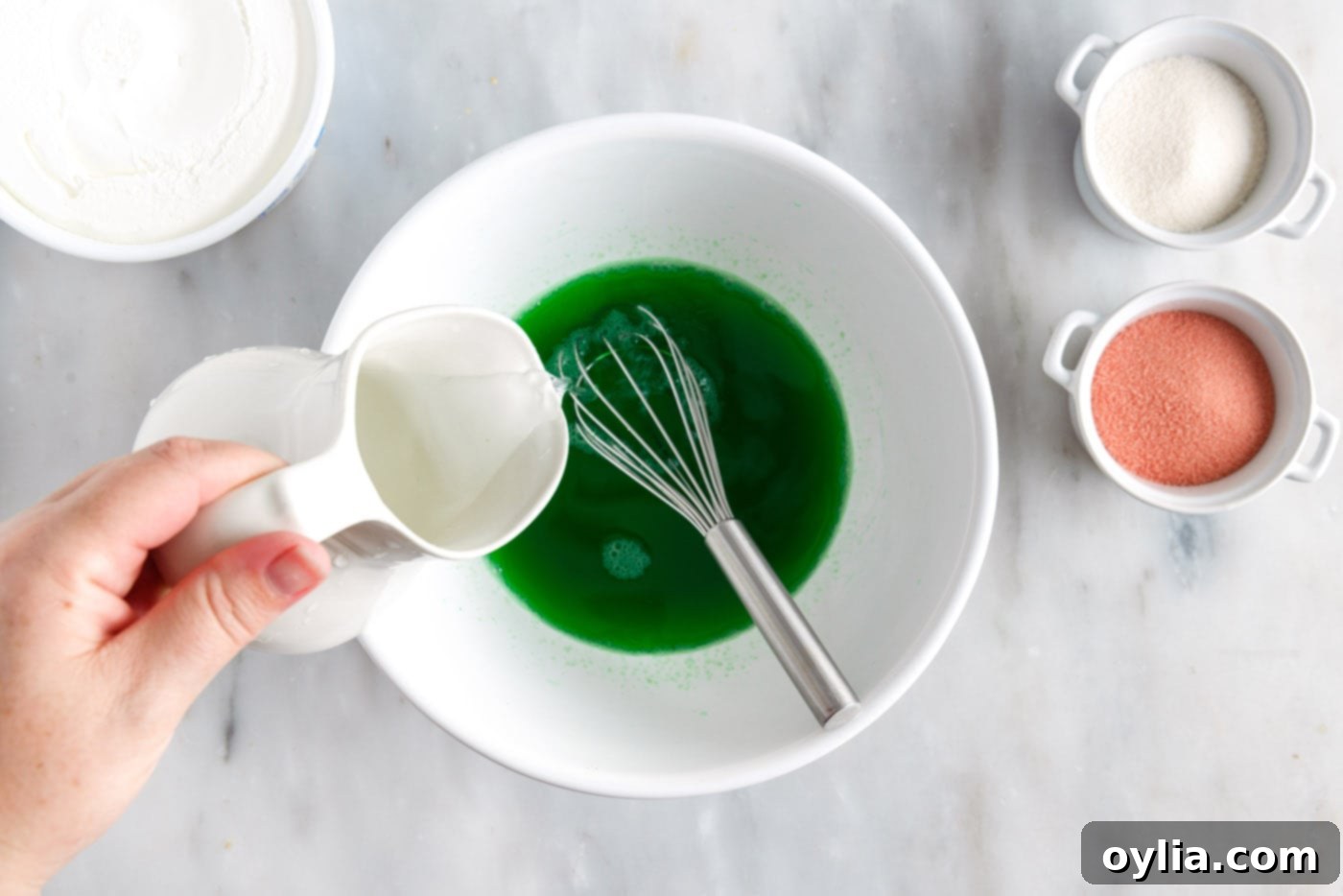 mixing jello powder with water
