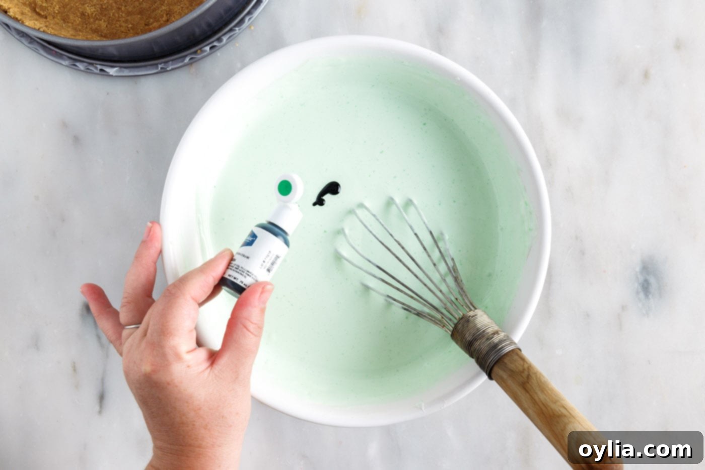 whisking lime jello with gel food color