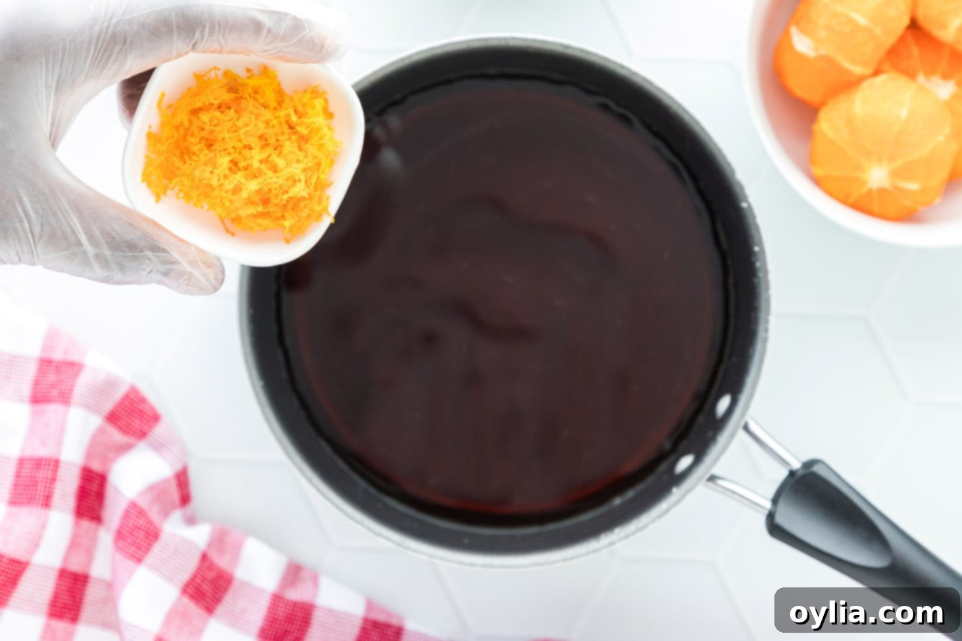 adding clementine zest to soy sauce mixture