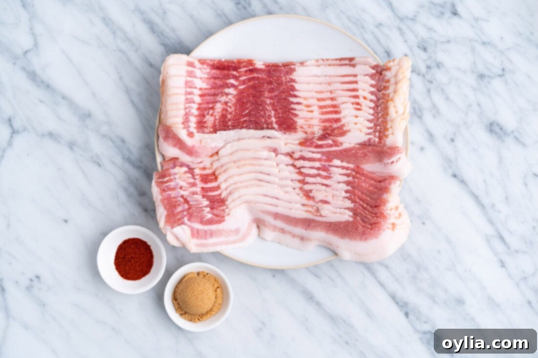 Ingredients for Sweet and Spicy Bacon Twists: thick-cut bacon, brown sugar, and cayenne pepper laid out.